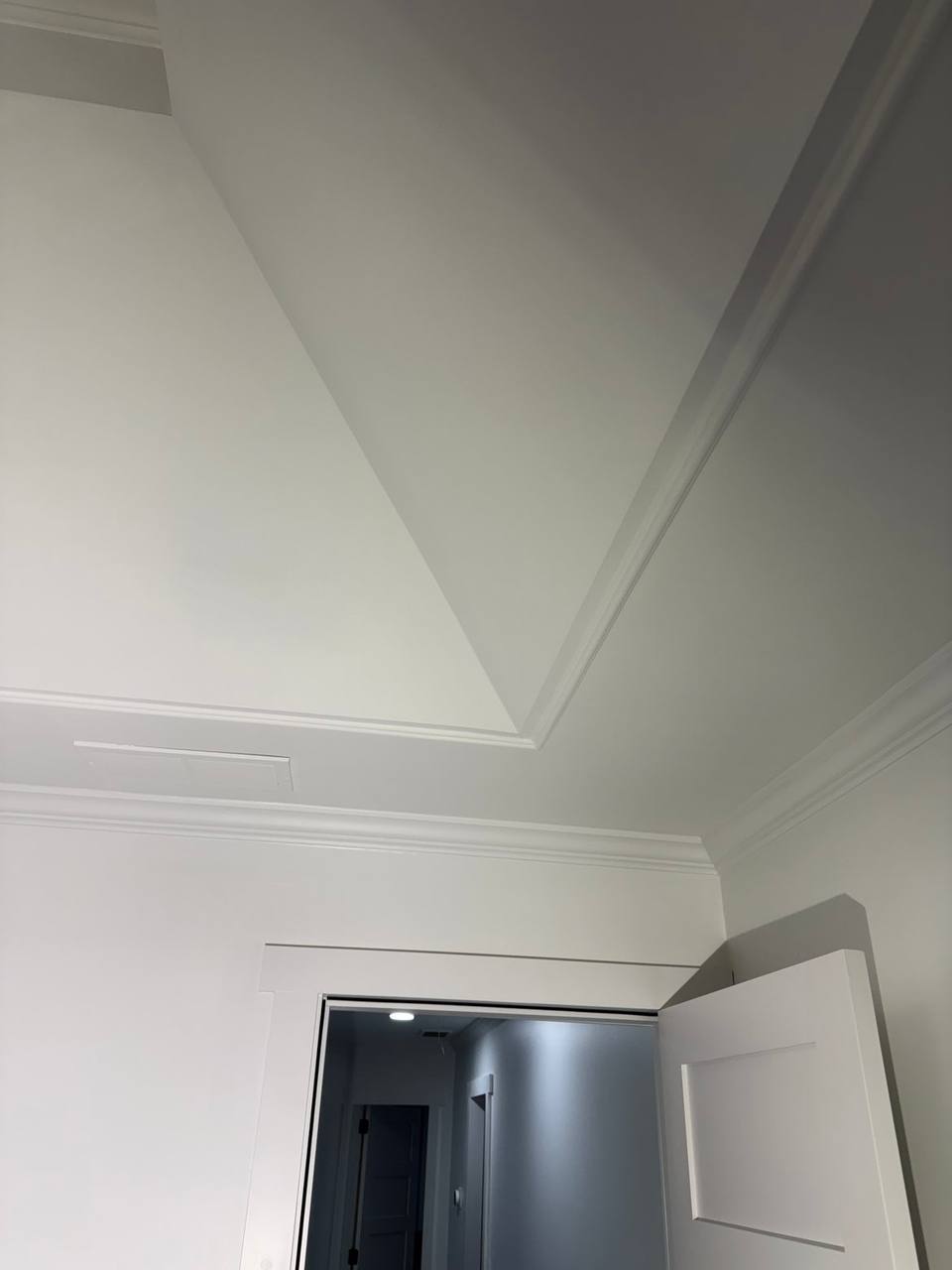 Tray ceiling and crown molding painted white